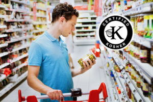 shopping concept, man reading label on the jar